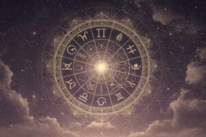 Astrological wheel showing major and minor planetary aspects with tension and harmony indicators.
