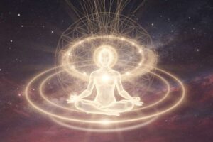 Woman meditating peacefully in natural light while focusing on emotional alignment and inner peace.