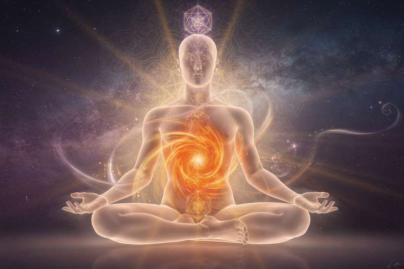 Sacral chakra energy center visualization showing orange light at the lower abdomen area of human body.