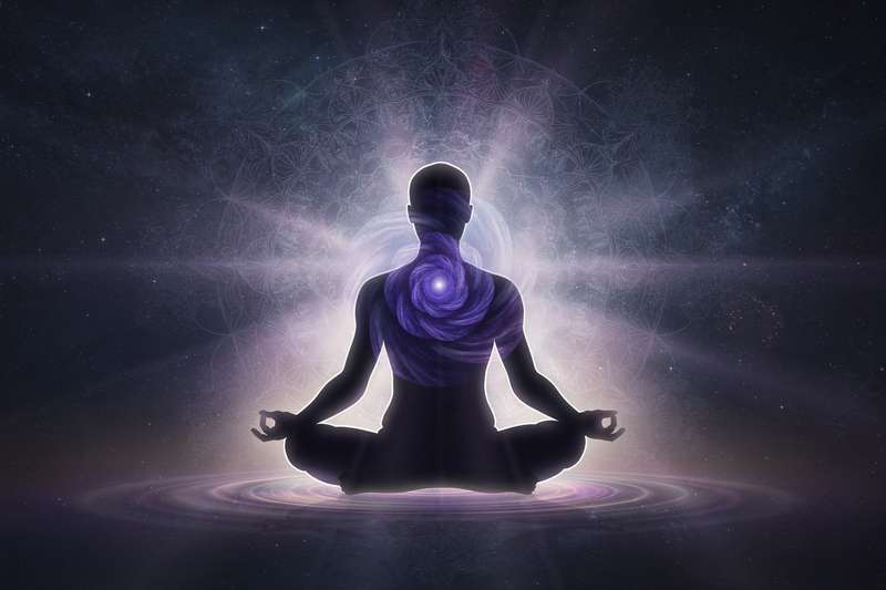Purple and blue crystals arranged in a circle representing stones used to activate and balance the third eye chakra.