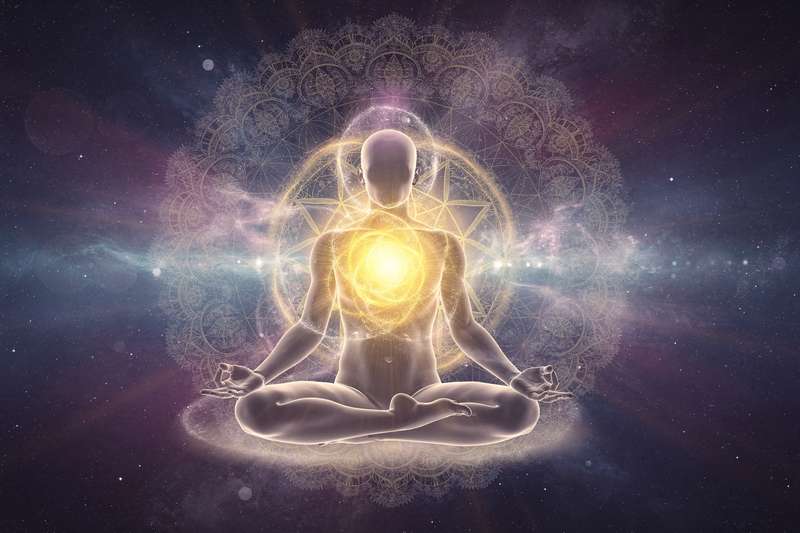 Yellow glowing energy sphere centered in the abdomen representing personal power and confidence.