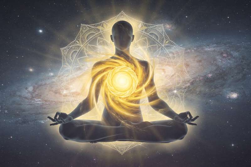 Yellow glowing energy sphere located in the upper abdomen representing the solar plexus chakra activation.