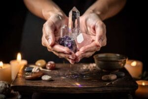 Assorted crystals arranged on a wooden surface for meditation and mindfulness practices.