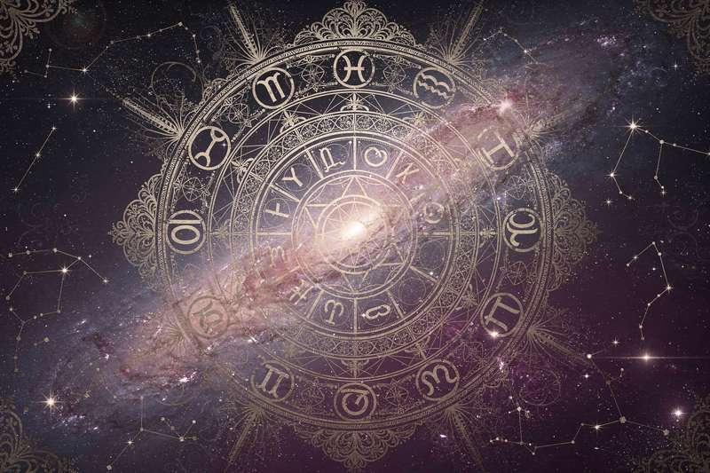 Mysterious man with intense gaze representing the passionate and secretive nature of a Venus in Scorpio personality.