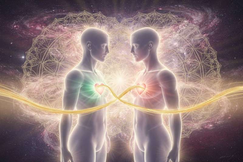 Two souls connecting through hands in a moment of spiritual recognition and deep emotional bonding.