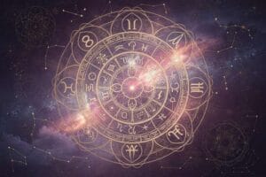 Aquarius zodiac symbol and constellation against a starry night sky background.