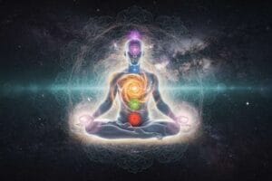 Peaceful practitioner in yin yoga pose holding a gentle stretch to align and balance the body's seven energy centers.