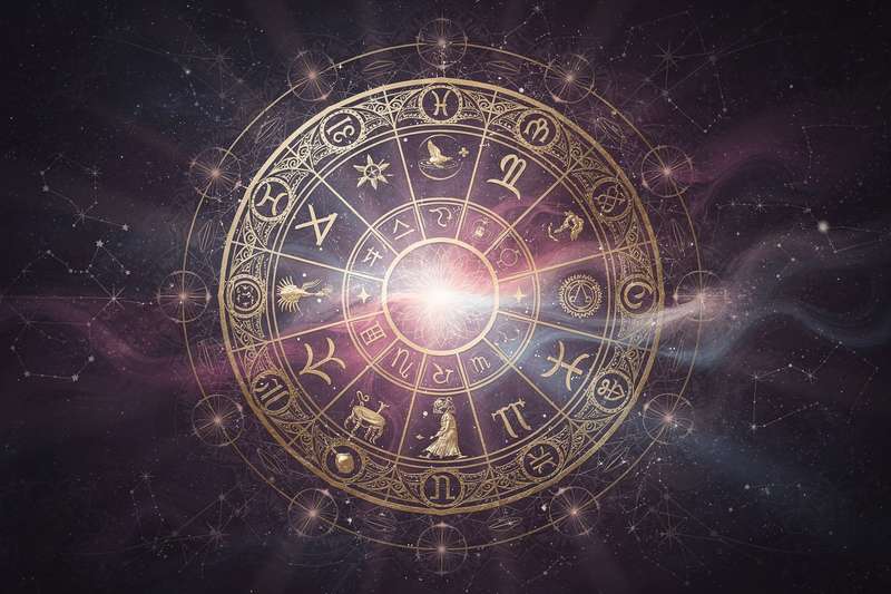 Libra man leaning forward with interest while talking to a woman at a social gathering.