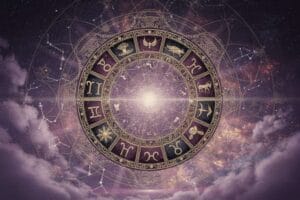 Zodiac wheel with heart symbols representing weekend romantic forecasts and grateful mindset themes.